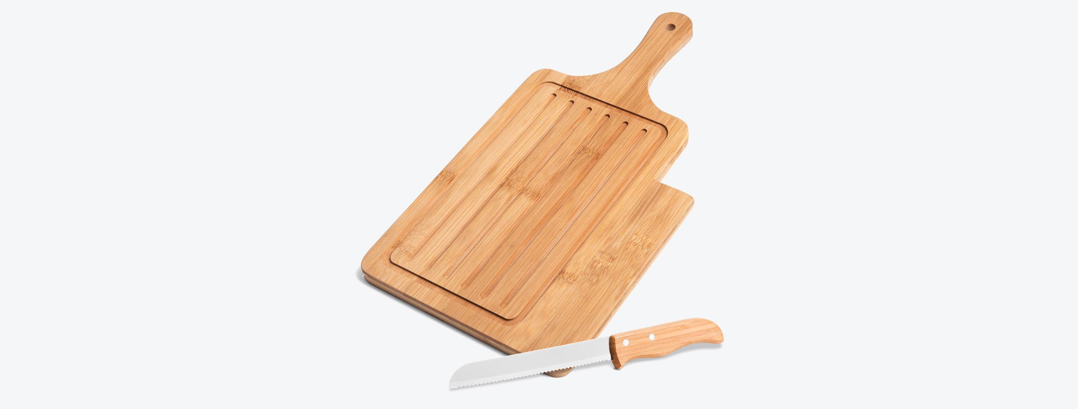 Migalheira / Tábua em Bambu com faca para pão 7 polegadas. Tábua com tripla camada invertida, o que dá mais resistência.